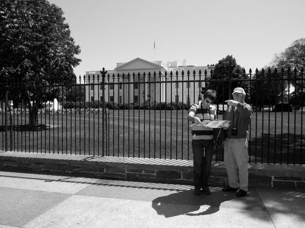 Free Image of Tourists With Map Outside White House 
