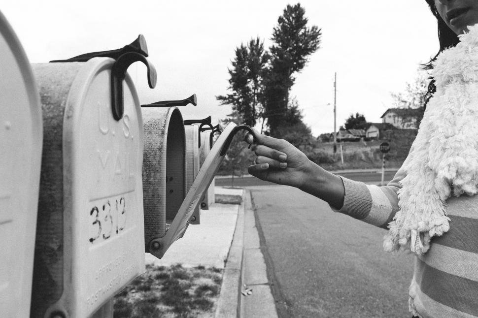 Free Image of Woman and Mailbox  