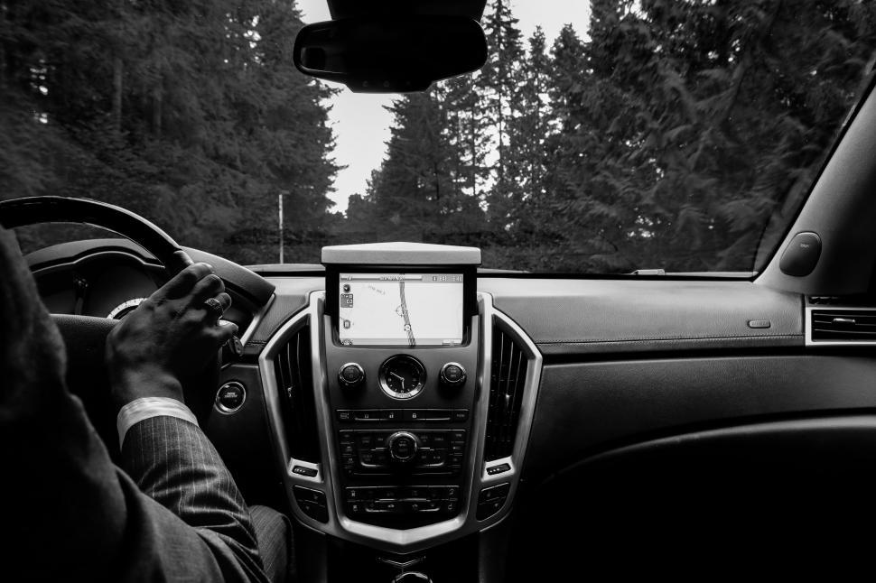 Free Image of Unrecognizable Man Driving Car - B&W 