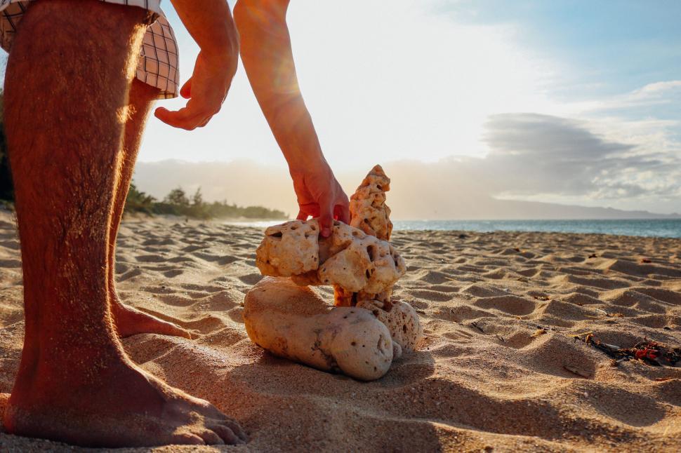 Free Image of Man Hands and Rock balancing 