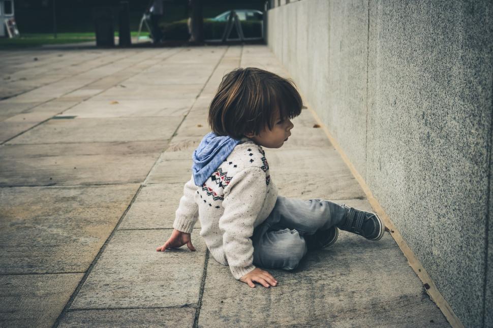 Free Image of Little Boy on the pavement  