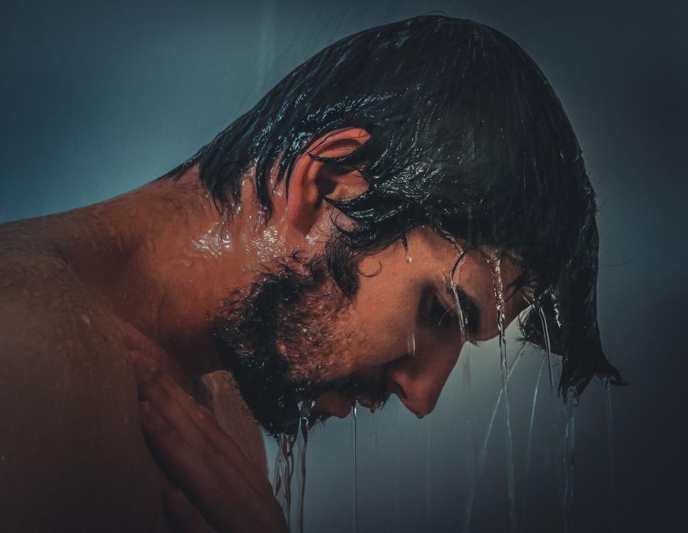 Free Image of Man Taking Shower  