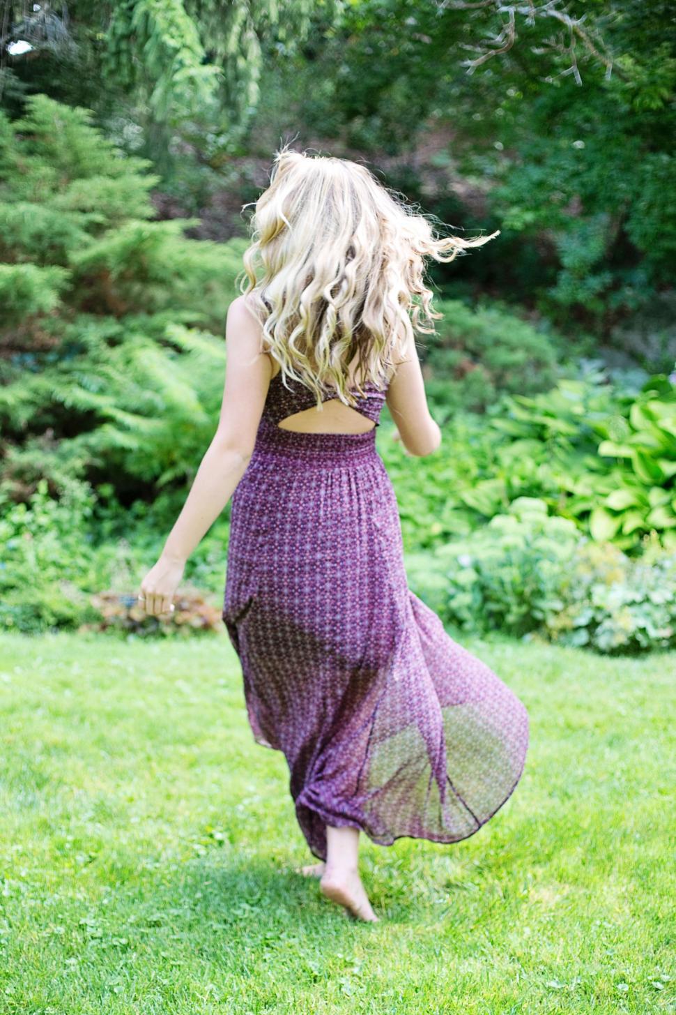 Free Image of Back View Of Blonde Woman Running in the Park  