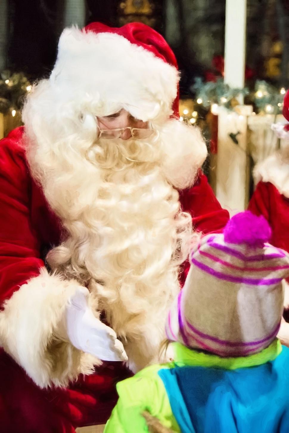 Free Image of Santa Claus and kid  