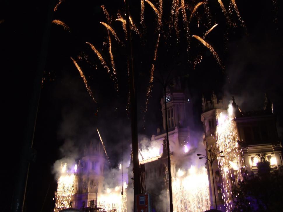 Free Image of Fireworks in the night over old building 