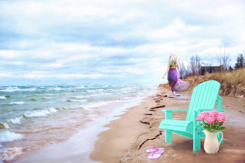 Free Image of Adirondack chair on beach with woman  