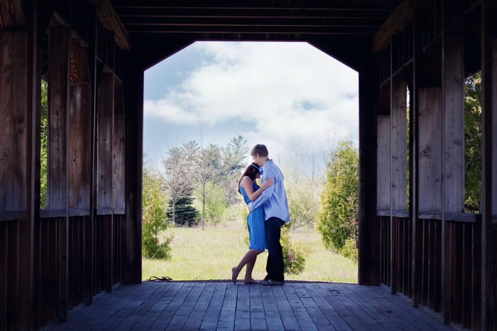 Free Image of Couple on Bridge 
