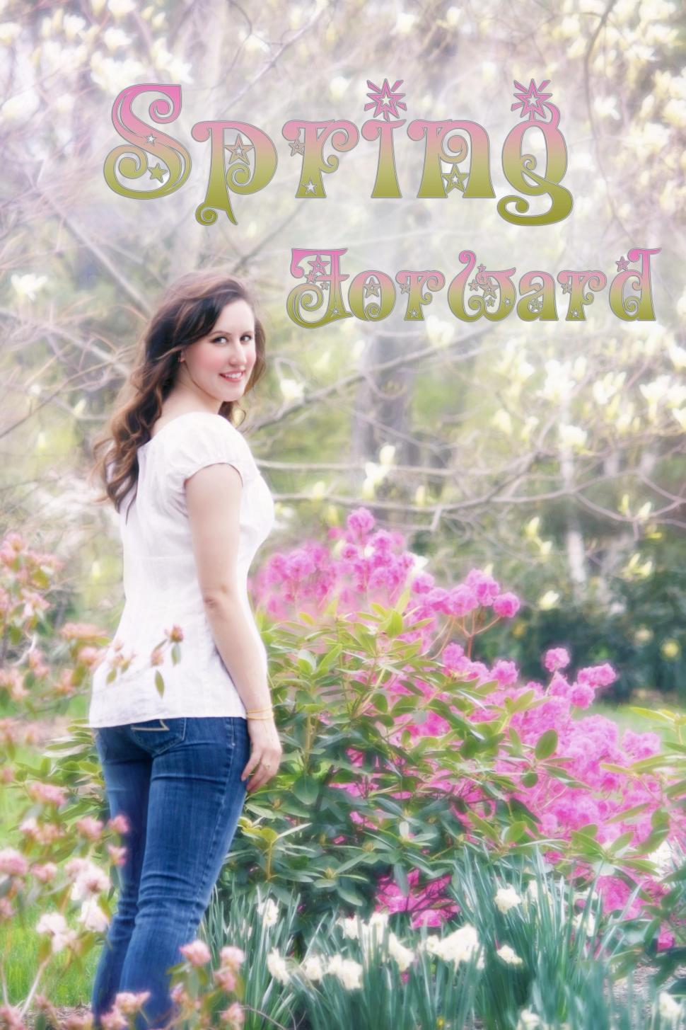 Free Image of Young Woman in flower field - looking over shoulder 