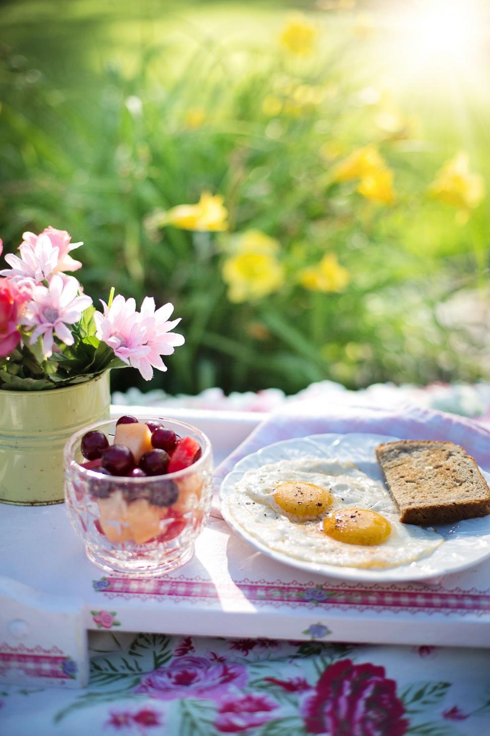 Free Image of Fried eggs and slice of bread - Breakfast  