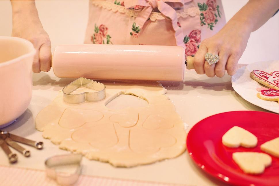 Free Image of Woman Hands and Heart shaped biscuits  