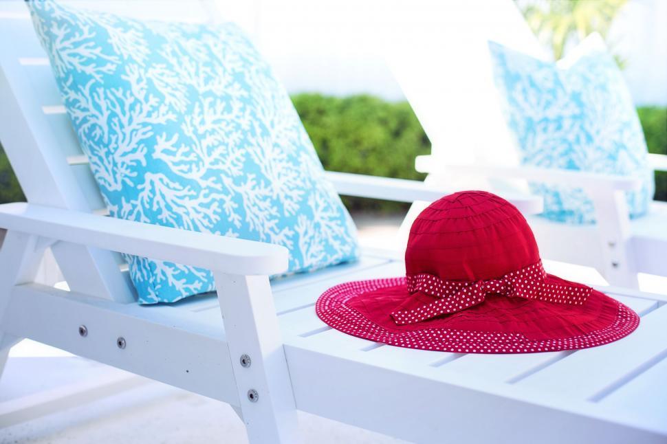 Free Image of Deck chair and hat 