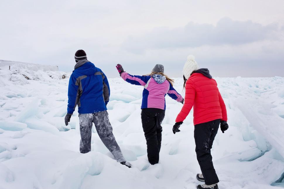 Free Image of People and Lake Huron With Snow 