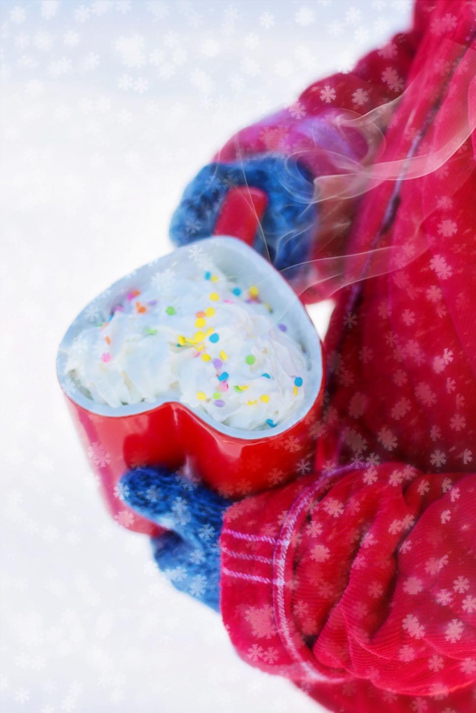Free Image of Heart Shaped Cup With Coffee in Snow 