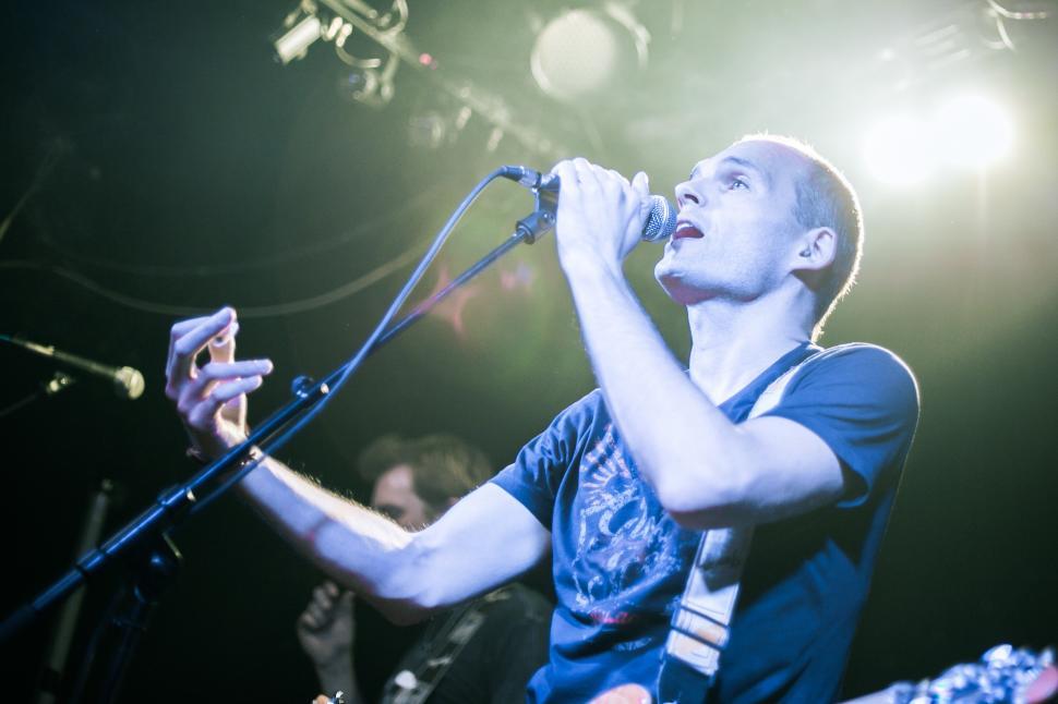 Free Image of Solo Singer performing on stage 