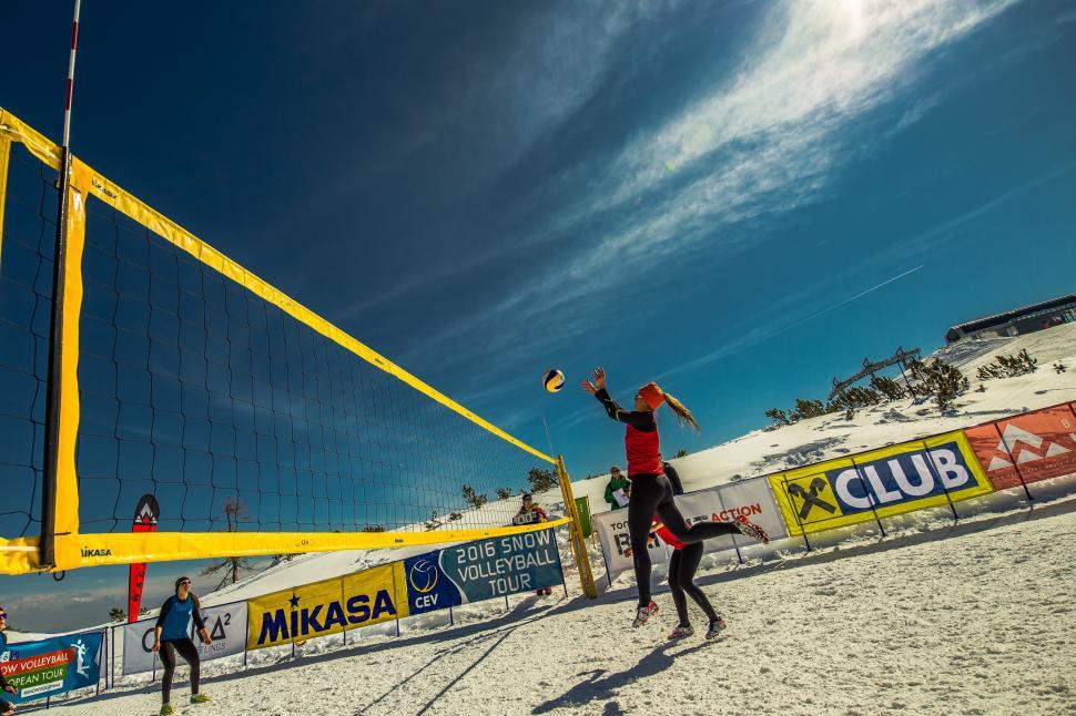 Free Image of Women playing snow volleyball 