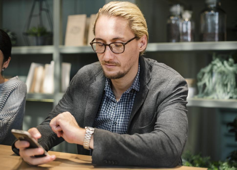 Free Image of A young Caucasian man checking time 