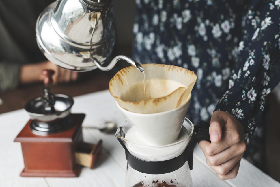 Free Image of Close up of hot water being poured into coffee filter cone - pour over 