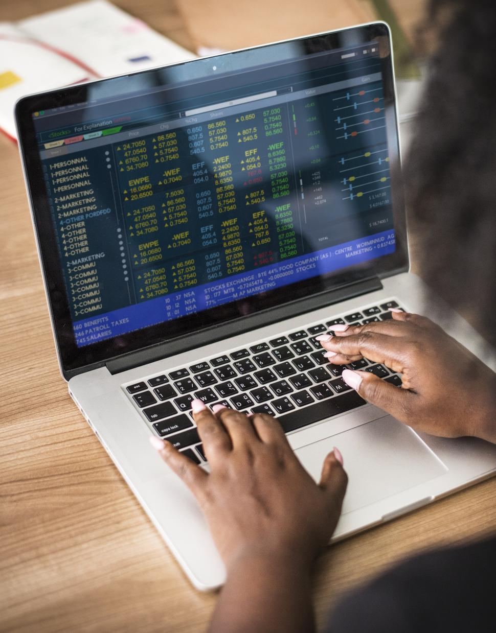 Free Image of Close up of a woman doing business work on the laptop 
