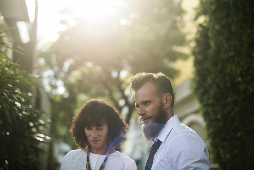 Free Image of Two people standing together outdoors 