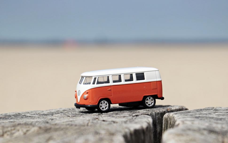 Free Image of Orange and White VW camper van - Toy Car 