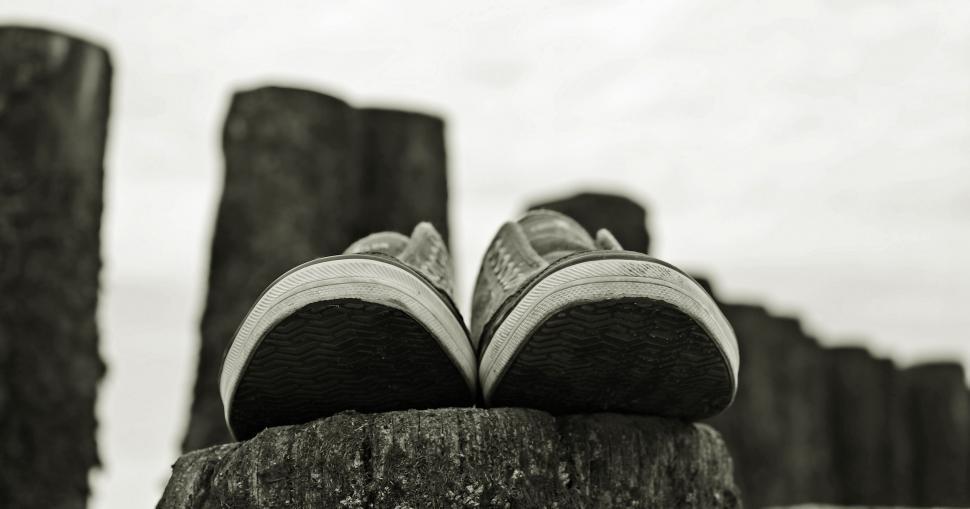 Free Image of Old Sneakers on Wood 