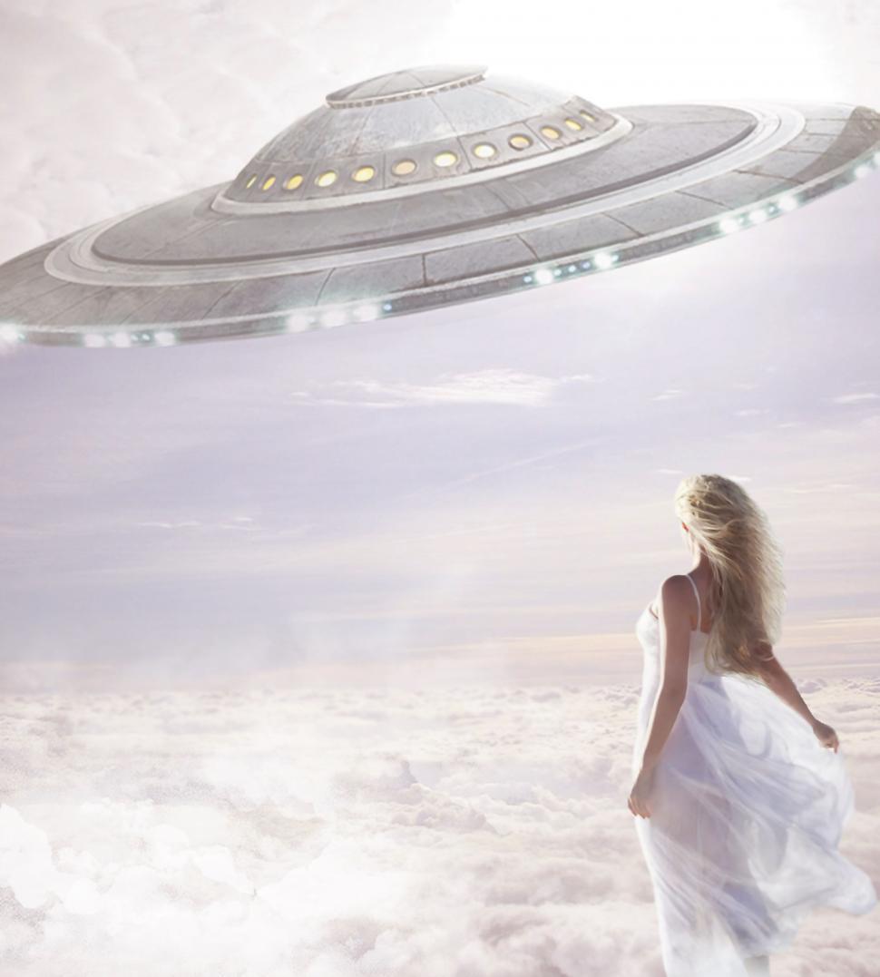 Free Image of Blonde Woman And White Clouds With UFO 