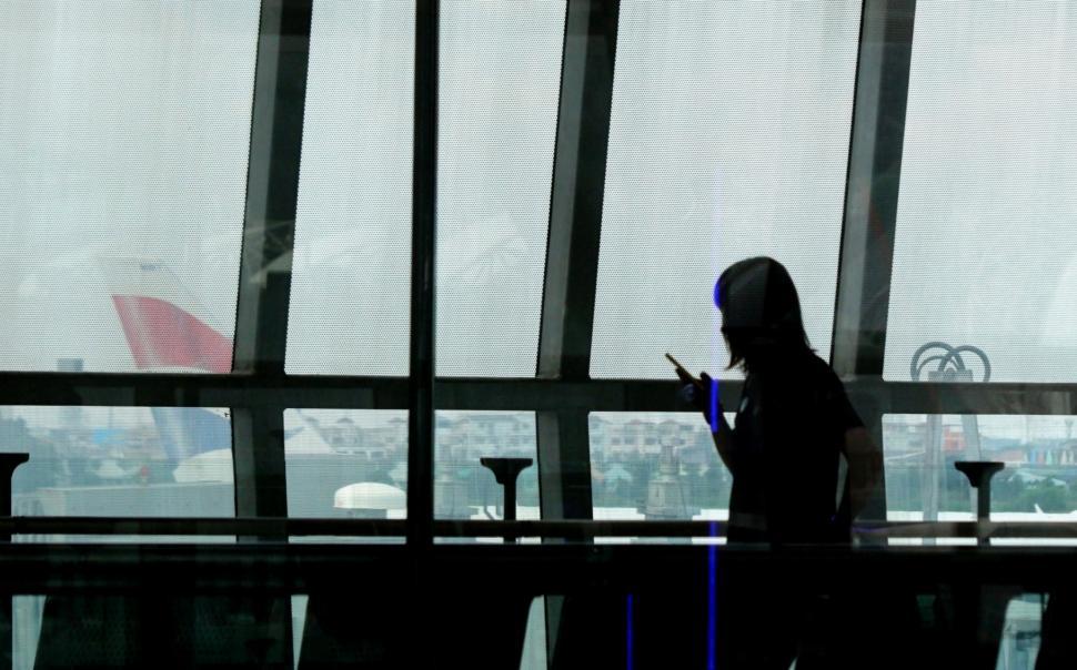 Free Image of Silhouette of Airport Passenger  