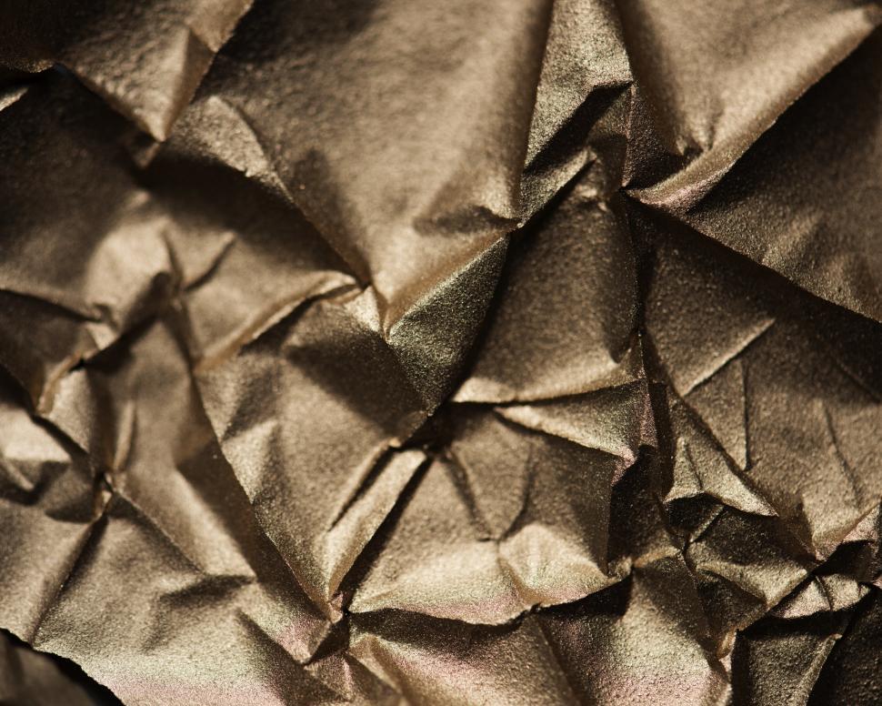 Free Image of Abstract texture of wrinkled golden paper 