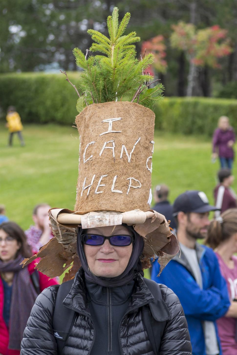 Free Image of Lady in a hat at a climate protest 