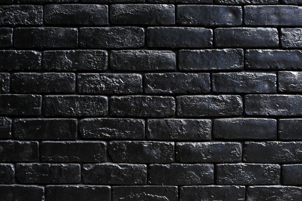 Free Image of Close up of a dark brick wall - black bricks 