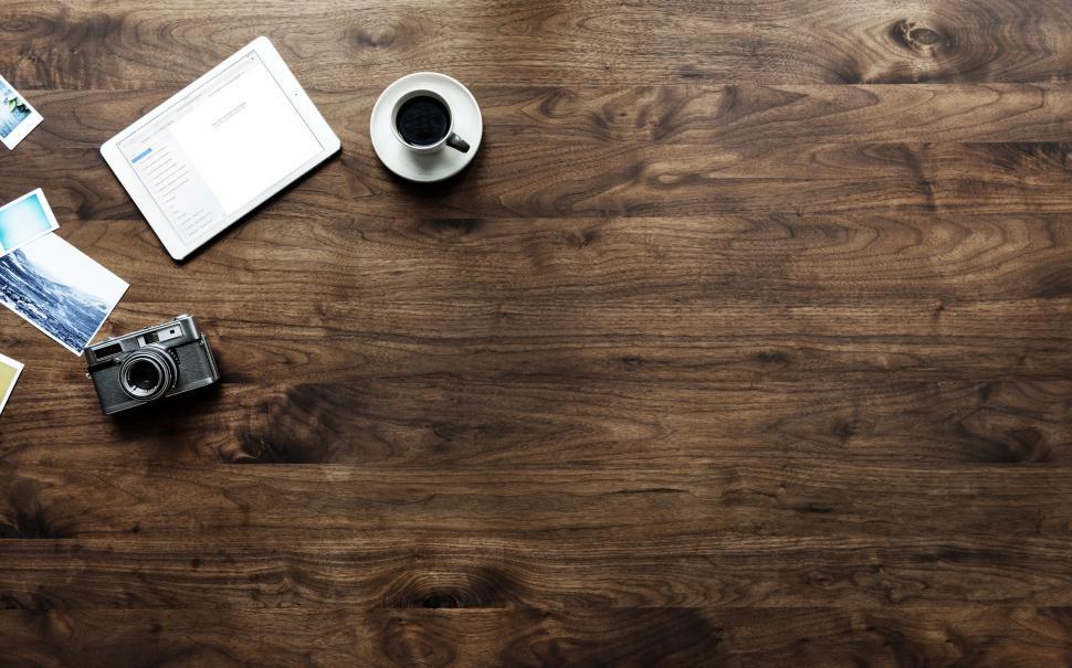 Free Image of Overhead view of a cup of coffee and a tablet PC and copyspace 