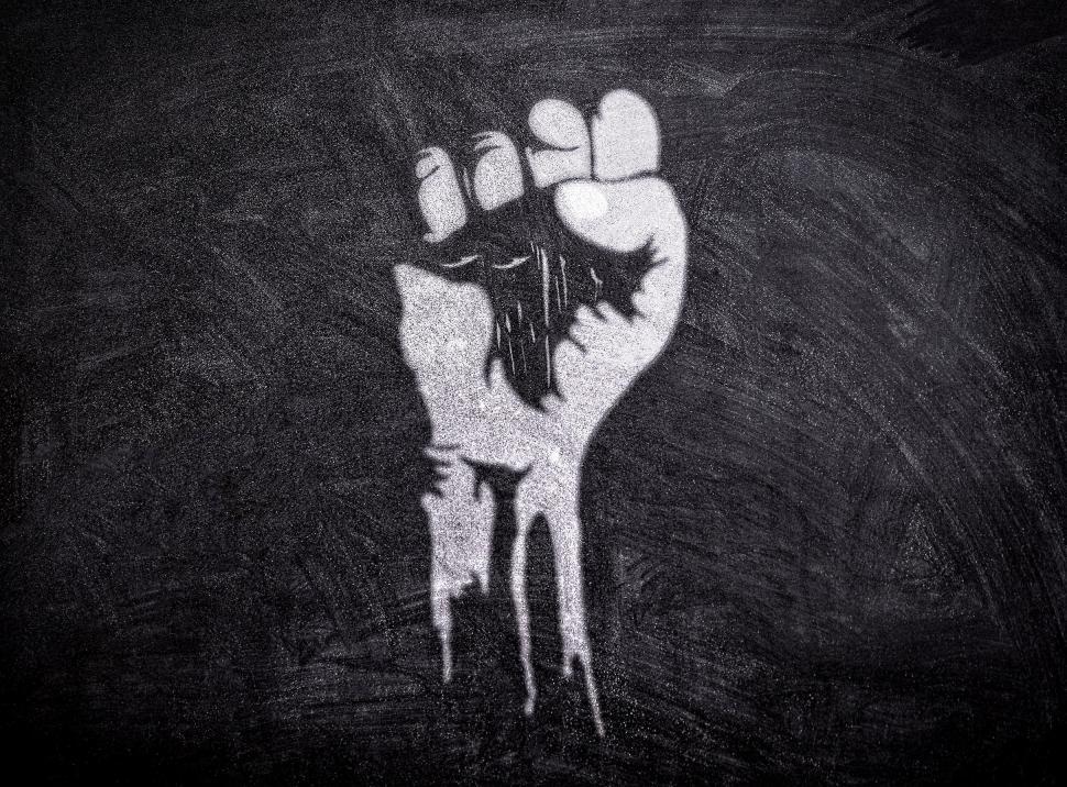 Free Image of Power to the People - Raised Fist on Blackboard 