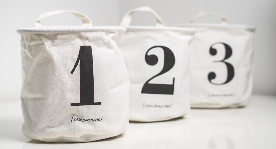 Free Image of Close up of three numbered bags 