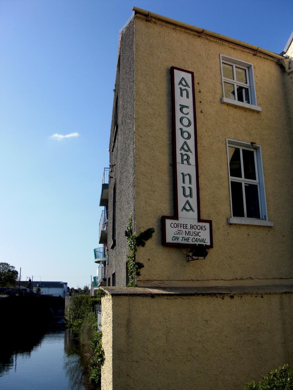 Free Image of Building With Sign on Side 