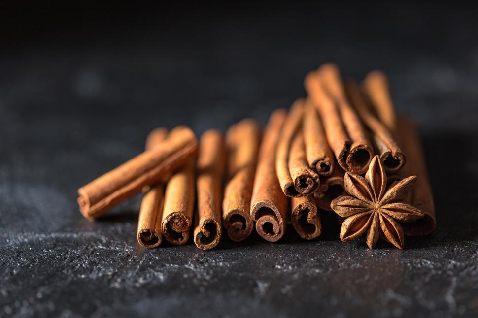 Free Image of Close up cinnamon sticks and star anise fruit 