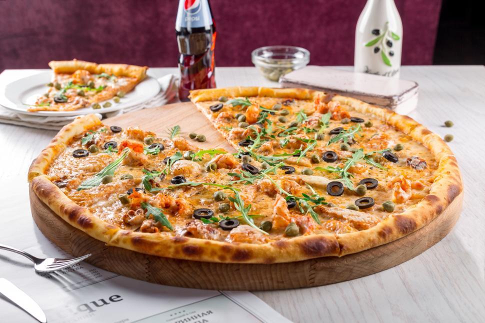Free Image of Close-up of without-one-piece pizza 