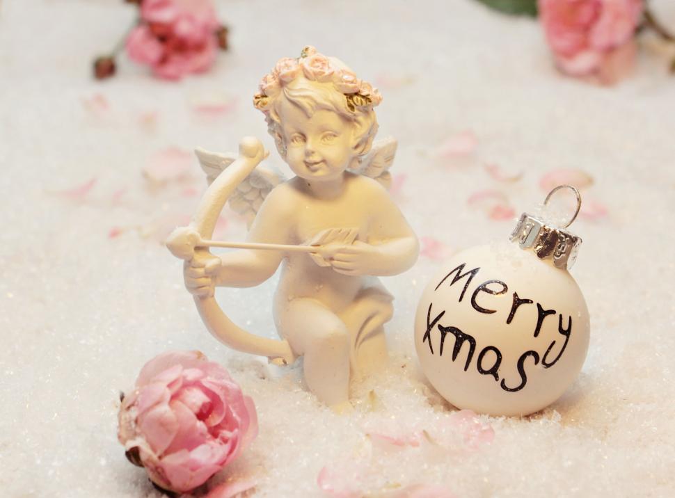 Free Image of Angel figurine with Christmas Ornament 