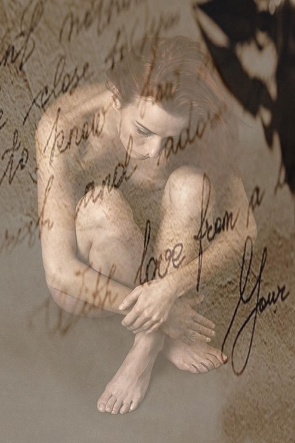 Free Image of Lonesome woman and love letters 