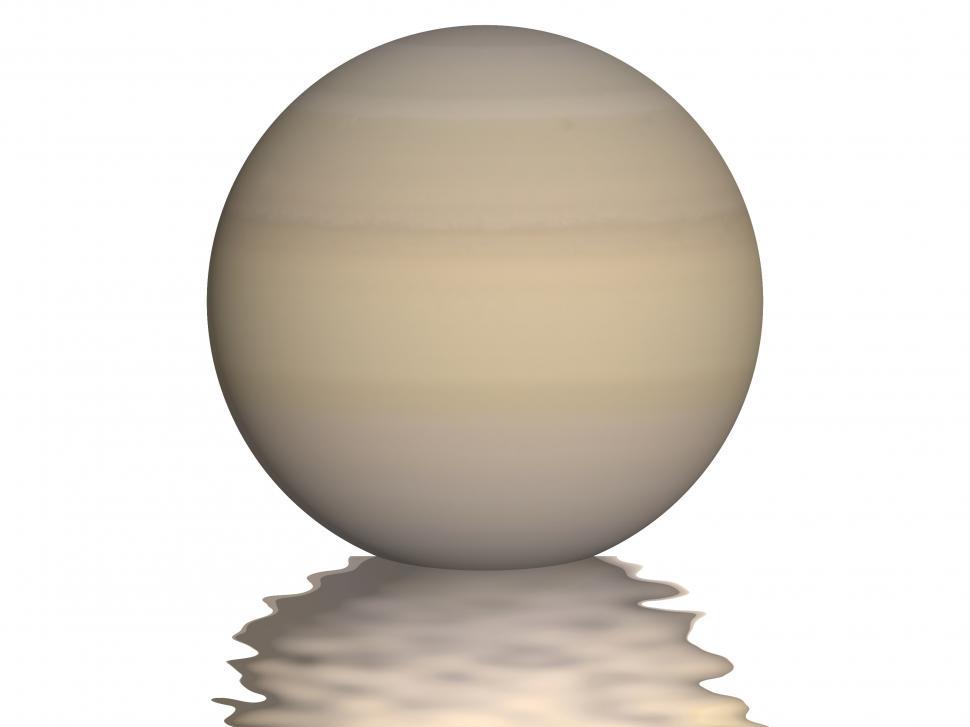 Free Image of Planet Saturn with small wavy reflection under it 