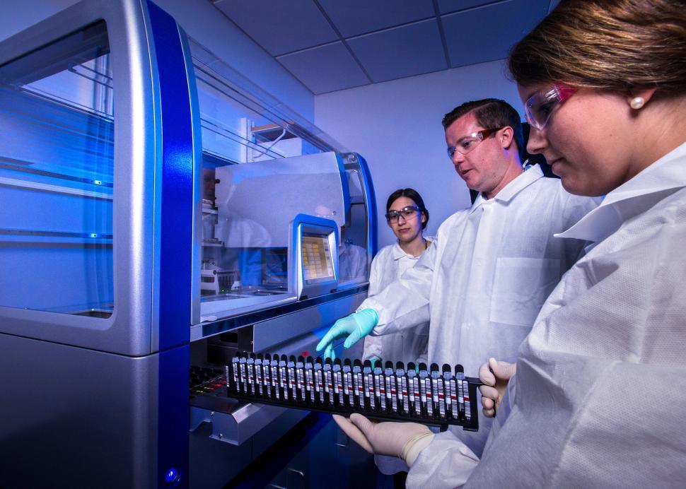 Free Image of CDC Scientists Testing Disease DNA 