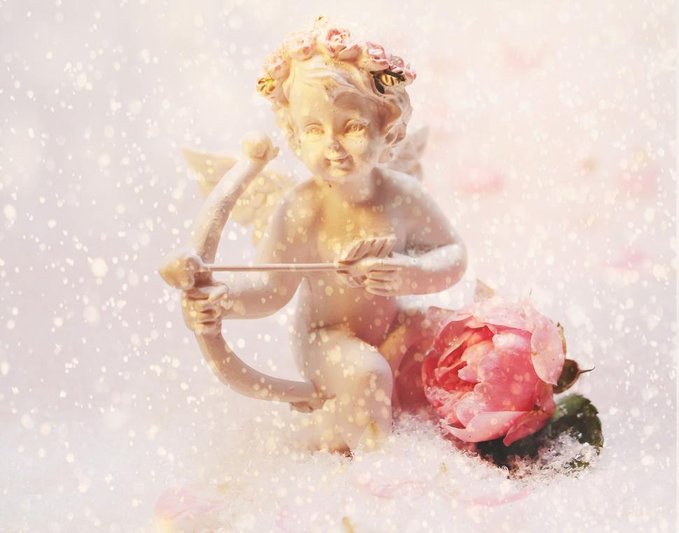 Free Image of Cupid and Flower 