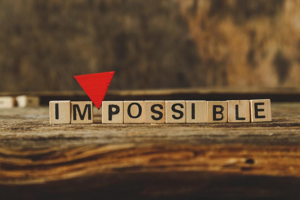 Free Image of Toy bricks spell IMPOSSIBLE 