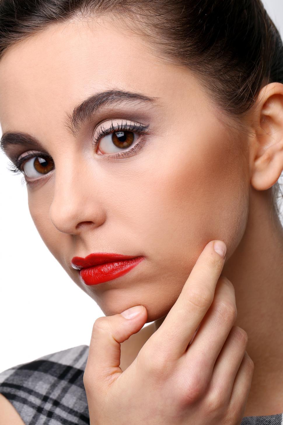 Free Image of Beautiful girl with perfect skin and red lipstick 