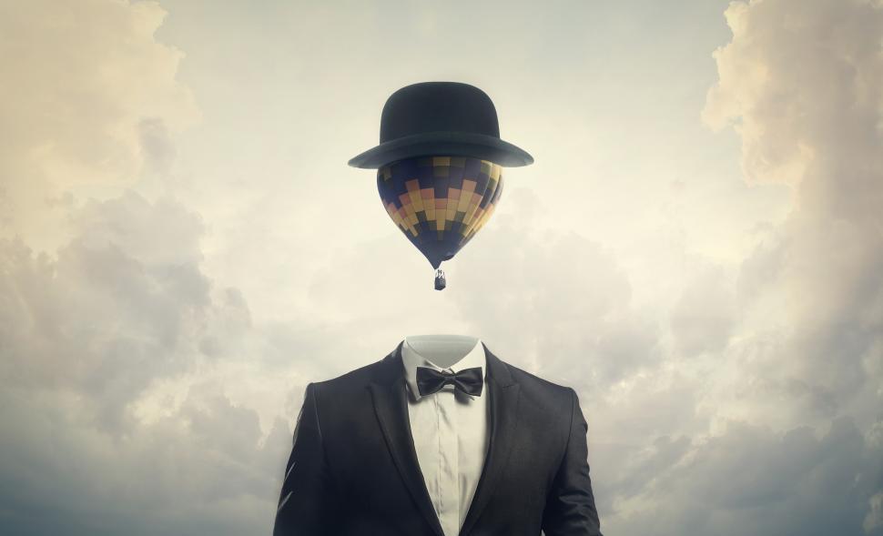 Free Image of Head in the Clouds - Businessman with Hot Air Balloon for a Head 