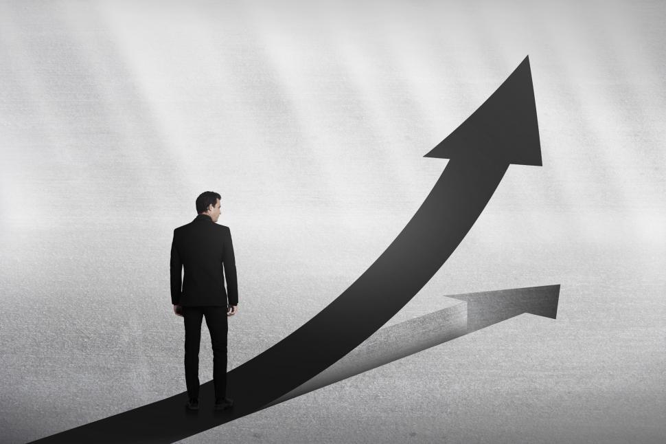 Free Image of Personal Growth Concept - Businessman on Upward Arrow 