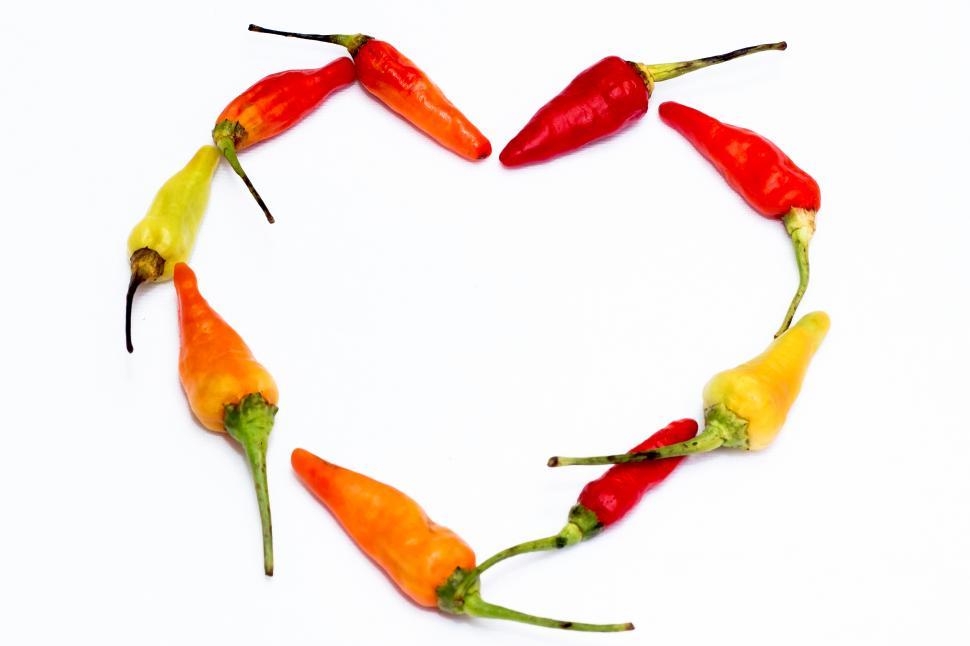 Free Image of Red Hot Chili  red chili forming heart 