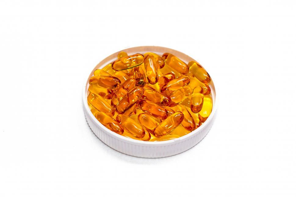 Free Image of pills on container white bowl 