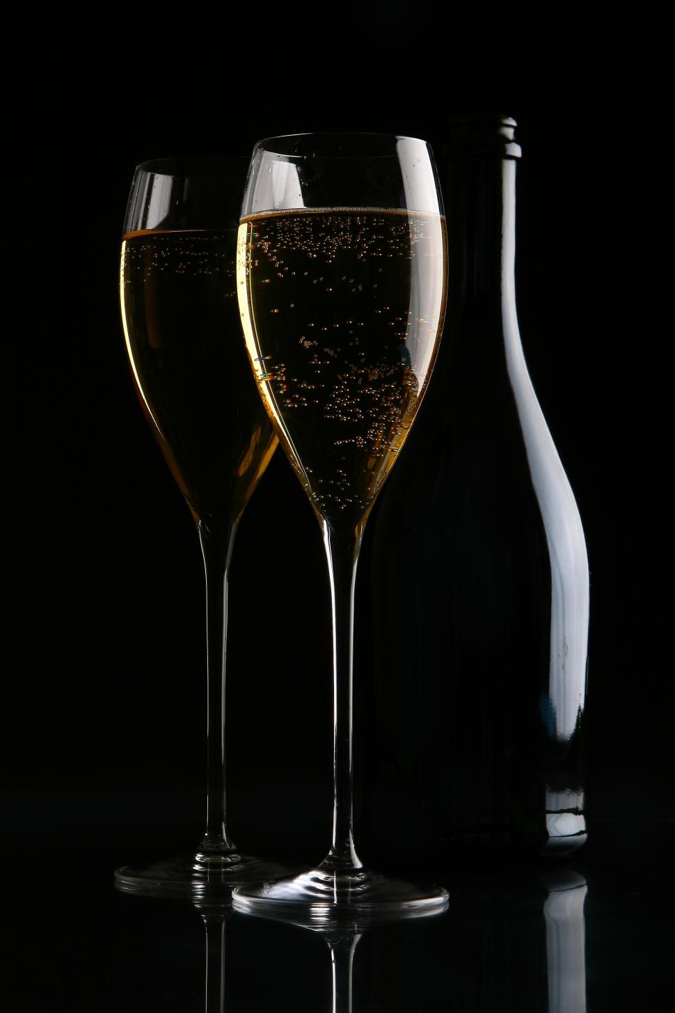 Free Image of Two elegant glasses with gold champagne 