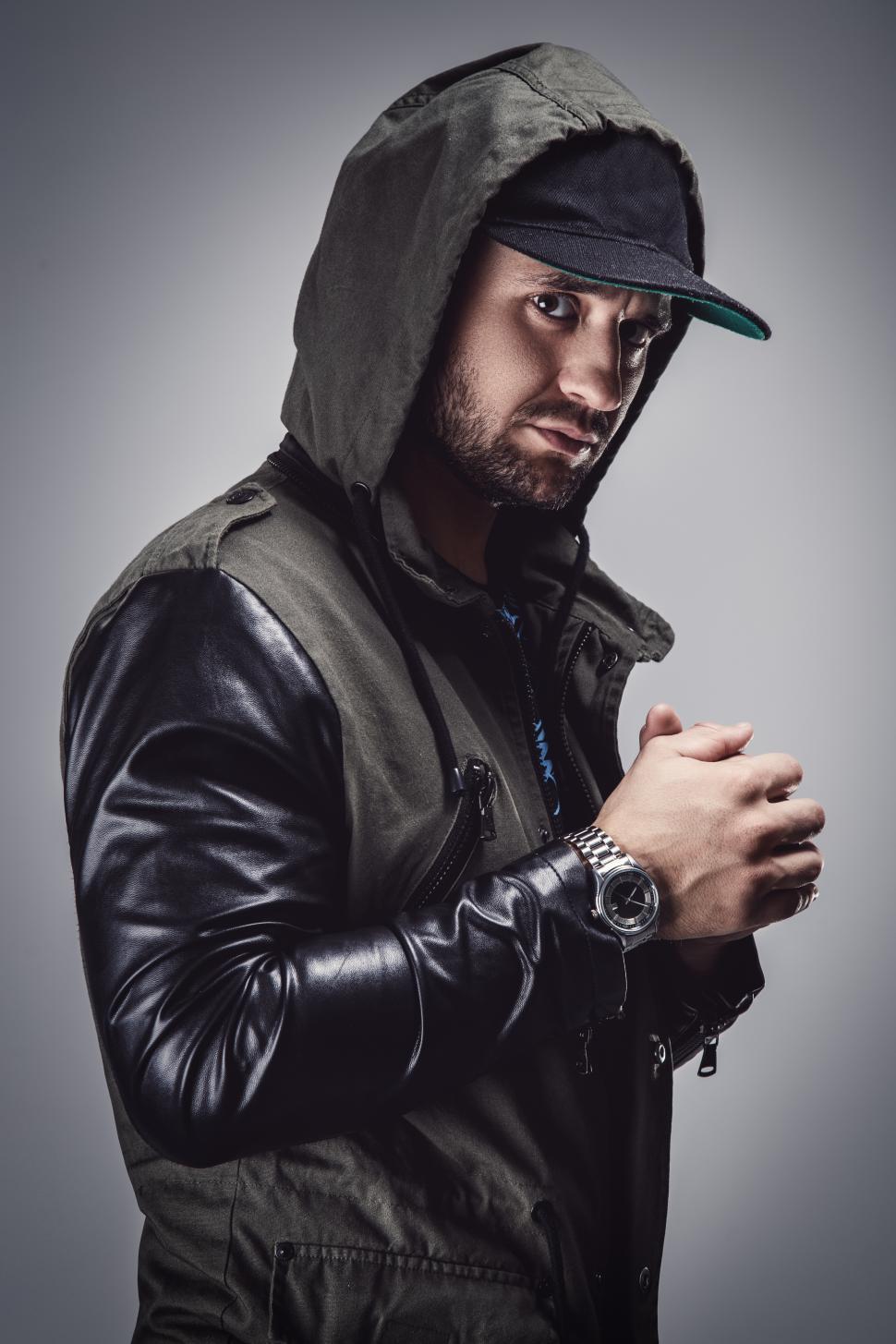 Free Image of Handsome guy in jacket and hat 