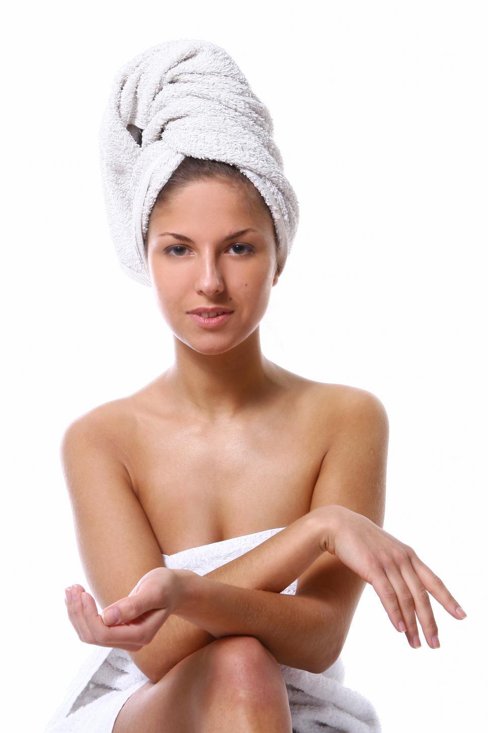 Free Image of beautiful girl sitting wearing white towel 